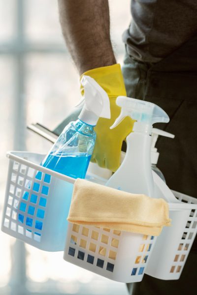 hand-holding-stand-with-cleaning-products